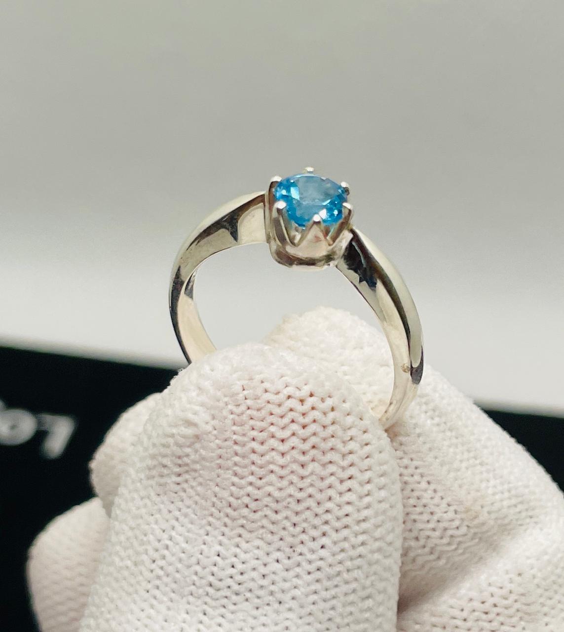 silver ring with natural blue topaz stone